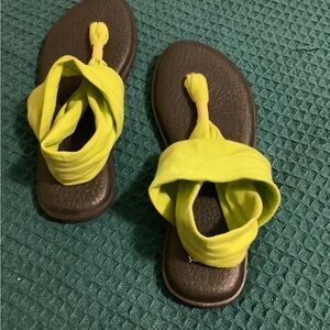 Vibrant Yellow Flip-Flop Sandals with Decorative Straps